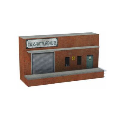 Background Rail Yard Building (red brick, gray loading door & platform, 1 level)