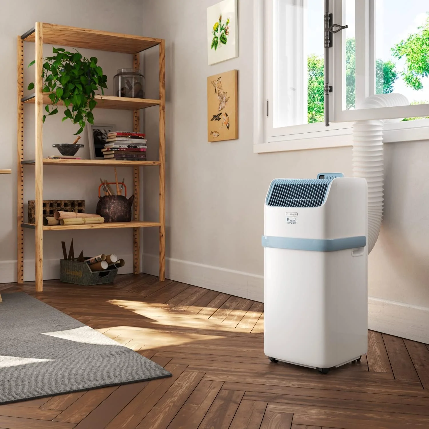 De'Longhi Pinguino – Mobil klímaberendezés, akár 21,5 m²-es helyiségekbe, párátlanítóval és ventilátorral, 8300 BTU, halk üzemmód, távirányító, 24 órás időzítő, A energiahatékonysági osztály (PACES72YOUNG)