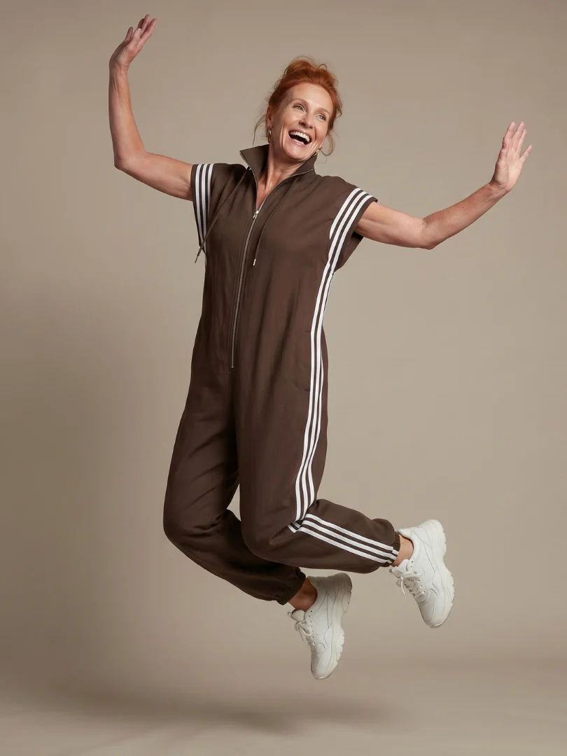 Women��s Zip Front Jumpsuit with Stripe Panel Detail