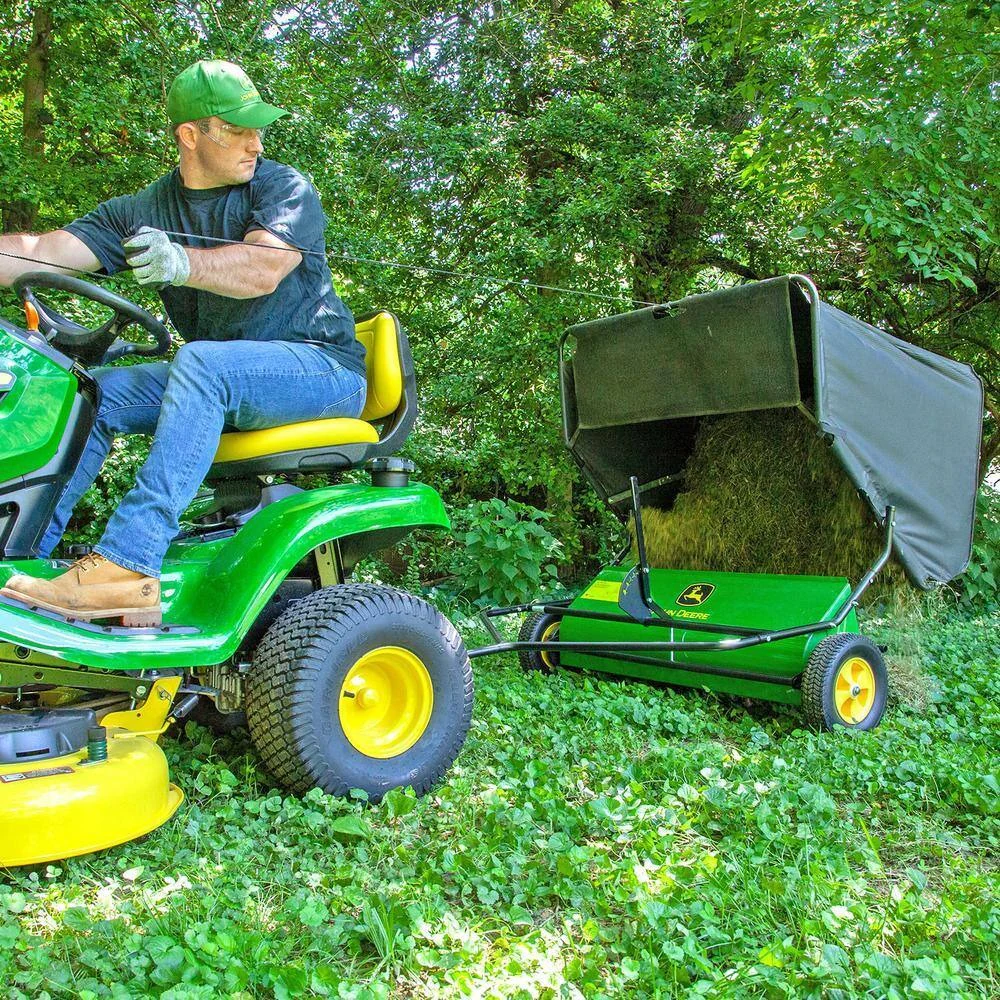 John Deere 42″ trailed lawn sweeper, 24 cubic foot capacity, adjustable brushes