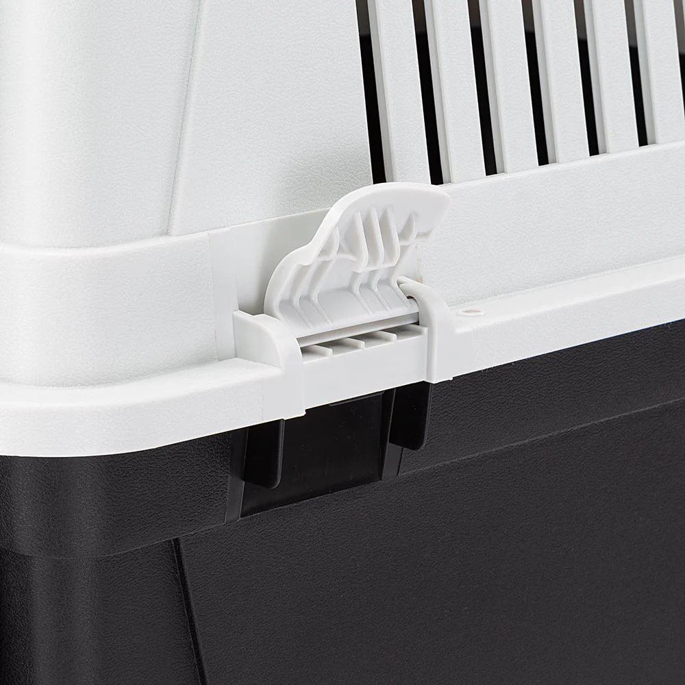 2025 Atlas 40 transportbox voor middelgrote honden �C veilig, geventileerd en IATA-conform. Met praktische handgreep, voederbak en optionele accessoires