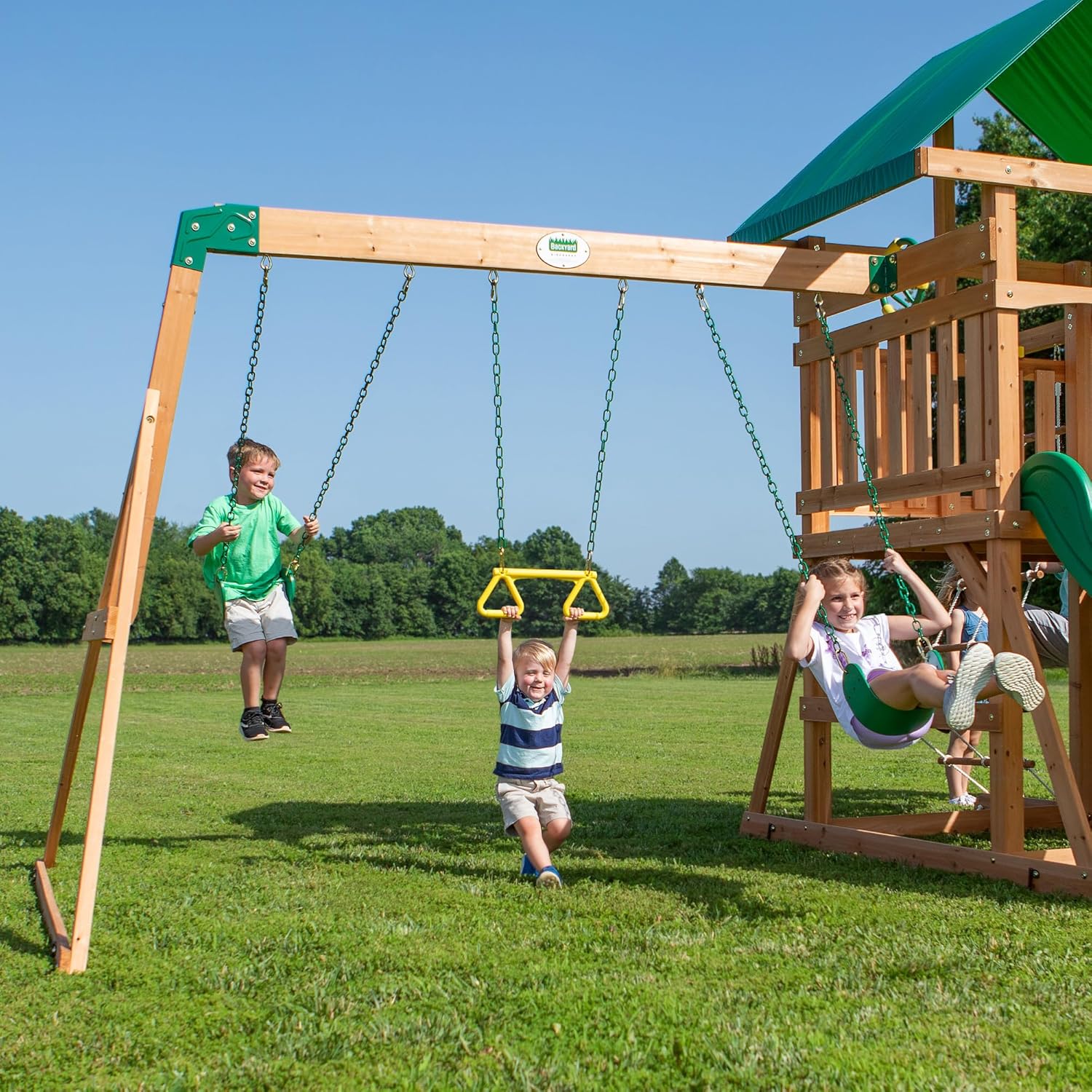Mount Mckinley Cedar Wood Swing Set with Wave Slide, Play Deck, Double Rock Wall, Rope Ladder, Web Swing, Belt Swings, Toy Telescope, Steering Wheel, Sandbox Area, Outdoor Playset
