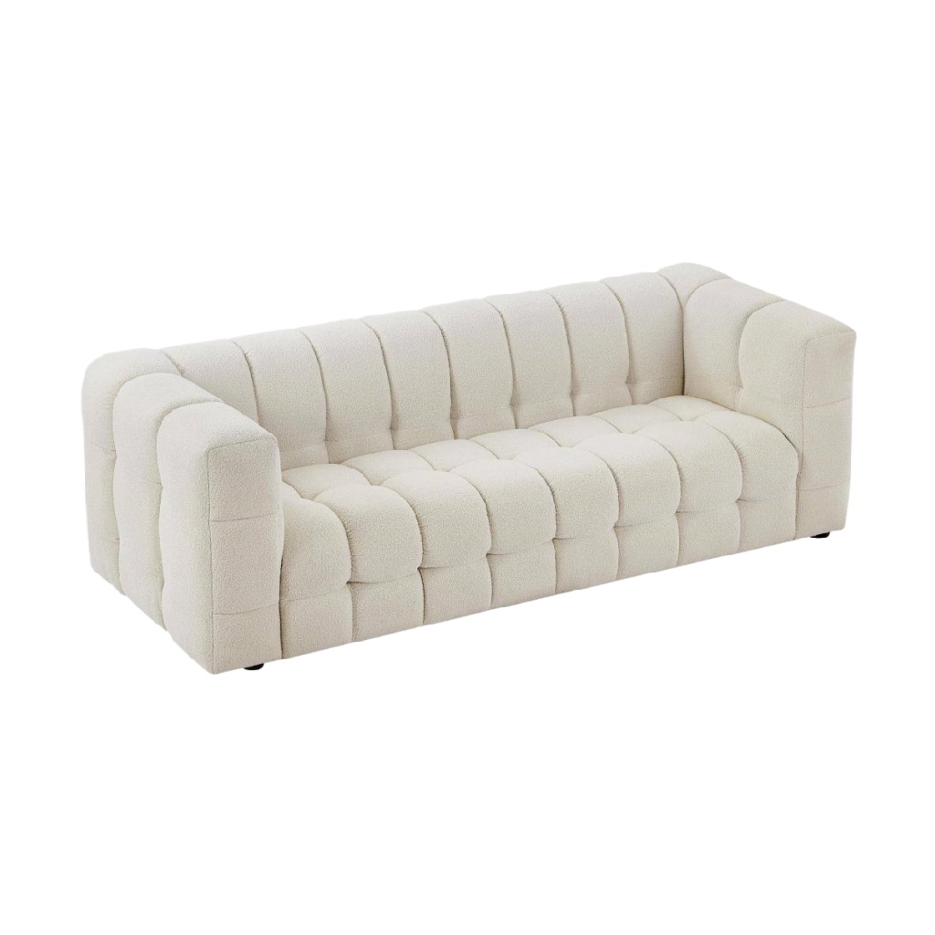 Canapé en bouclette blanche – style capitonné et design moderne