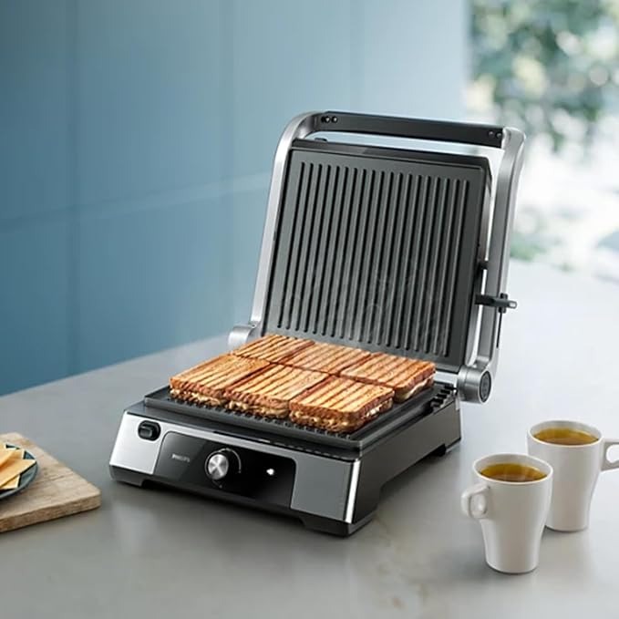 Philips Griglia Elettrica - Contact Grill. Temperatura regolabile. Ampio grill e prestazioni ad Alta Potenza. Piastre Antiaderenti e vassoio raccogli grasso rimovibili. (HD6301/90)