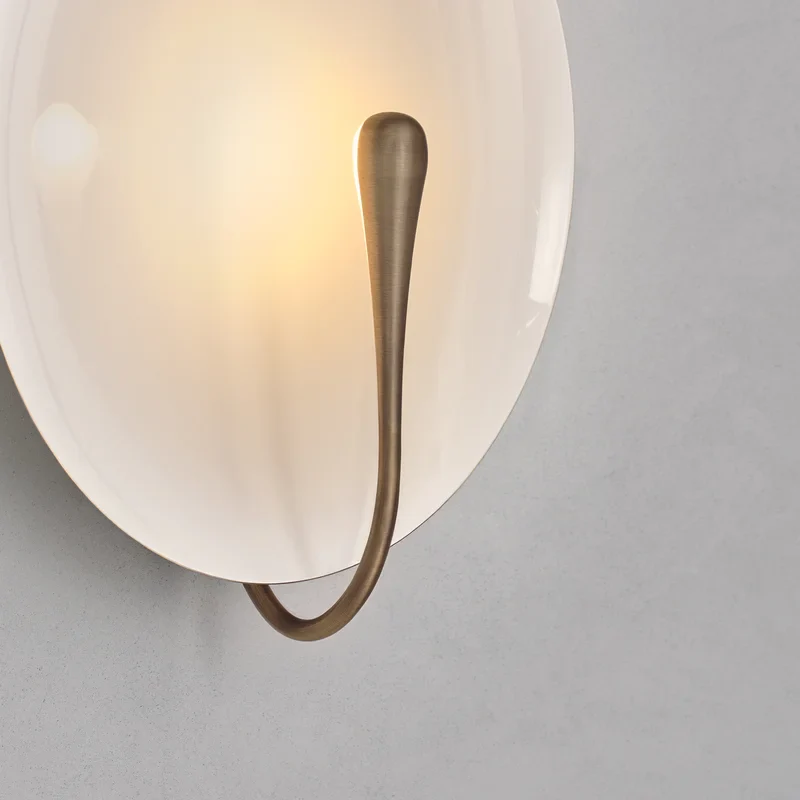 Murten | White Marble Wall Lamp in the Shape of Lens