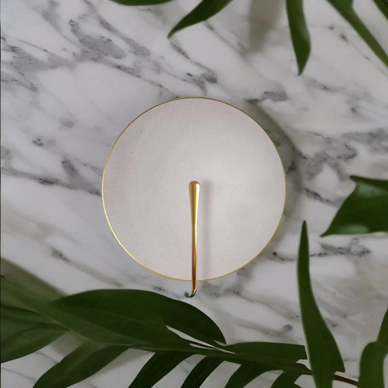 Murten | White Marble Wall Lamp in the Shape of Lens