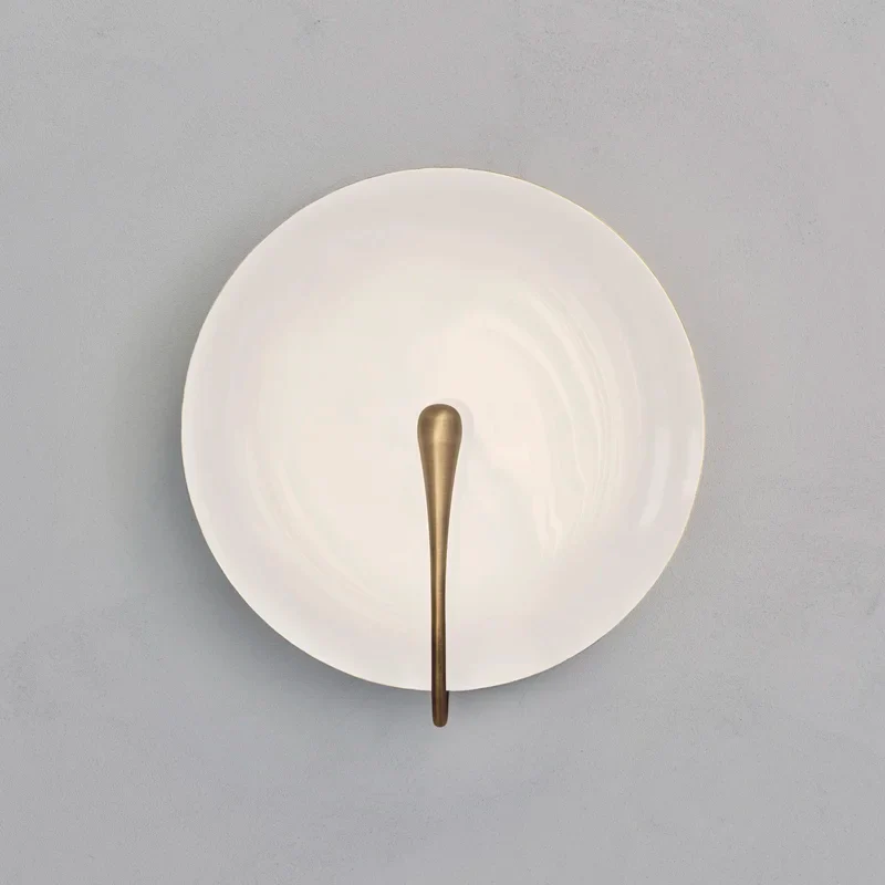 Murten | White Marble Wall Lamp in the Shape of Lens