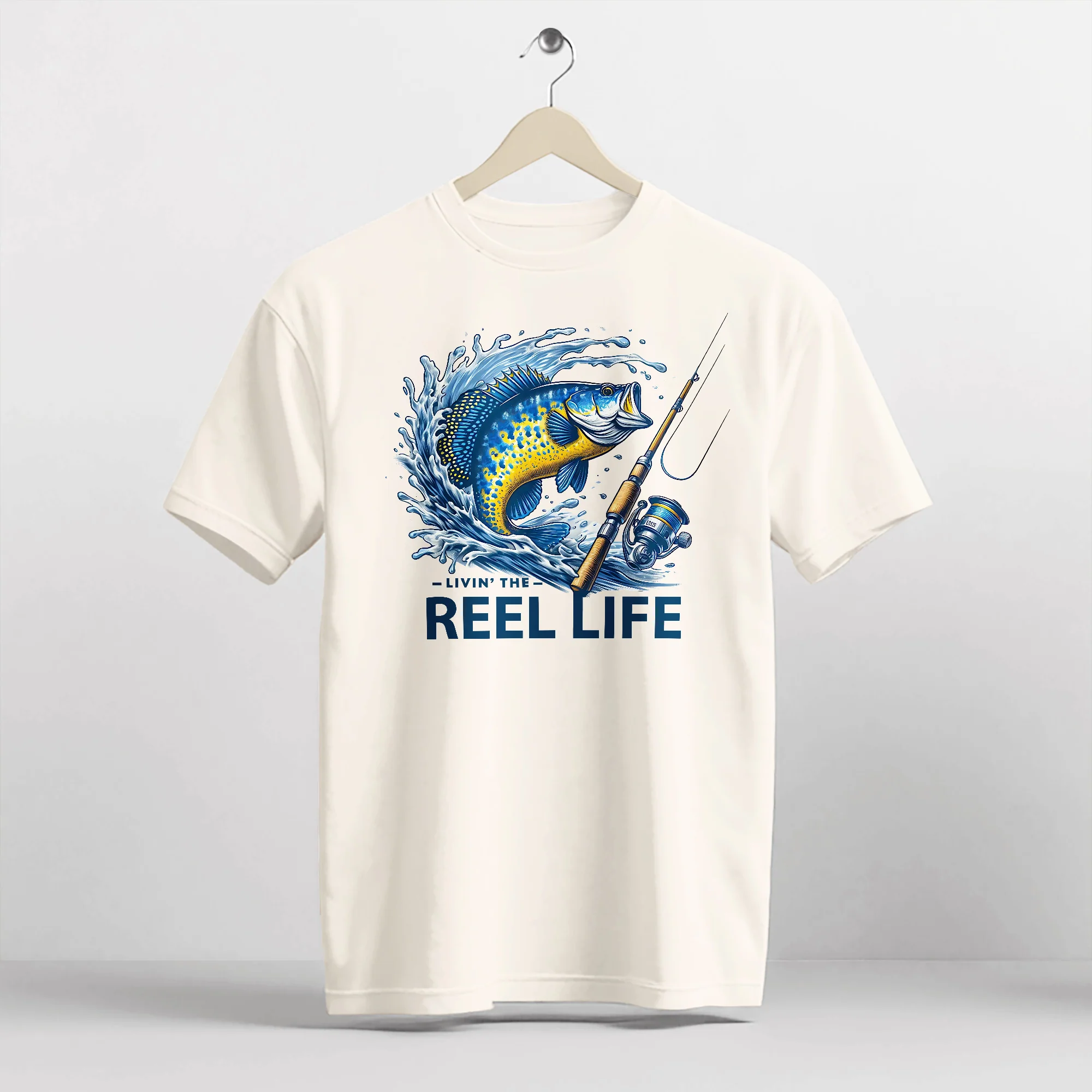Funny Fisherman Shirt �C Livin' The Reel Life Fishing Pun Tee �C Humor Gift for Anglers �C Natural �C Up To 5XL