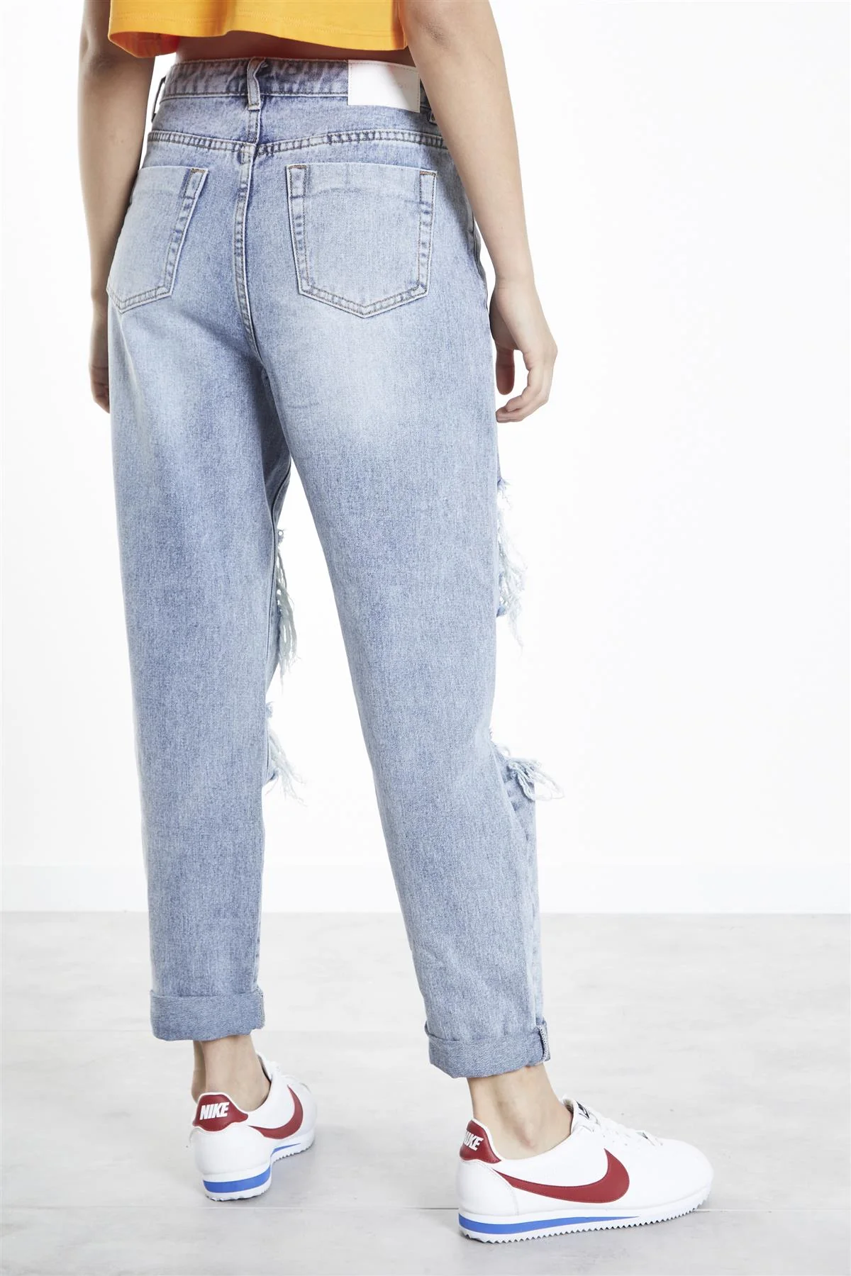 Light Vintage Wash Distressed Boyfriend Jeans.